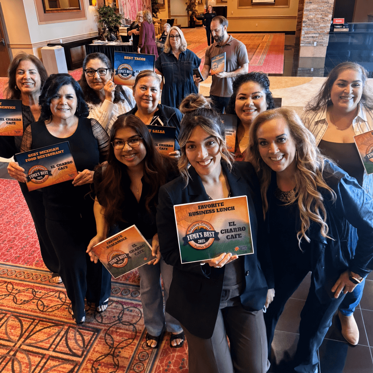 El Charro Cafe team holding their 2025 Yuma's Best Readers' Choice awards